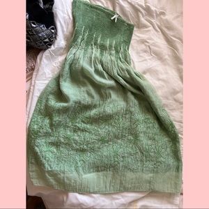 Long, strapless light green dress